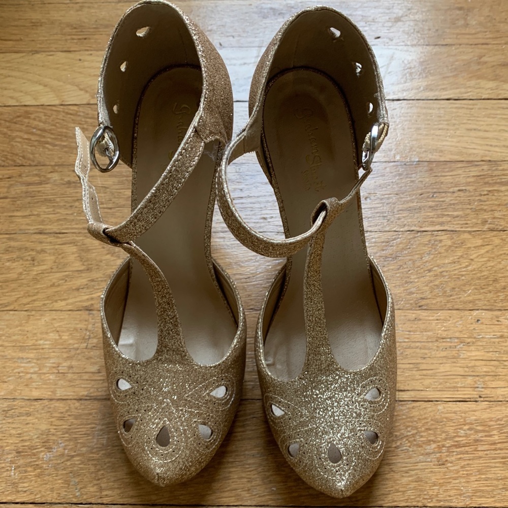Gold T-strap heels